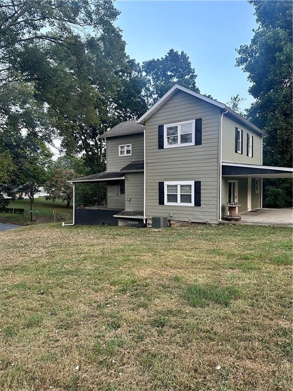 611 Mercer Road Beaver Falls, PA 15010 - Photo 2 of 32 a front view of a house with a garden