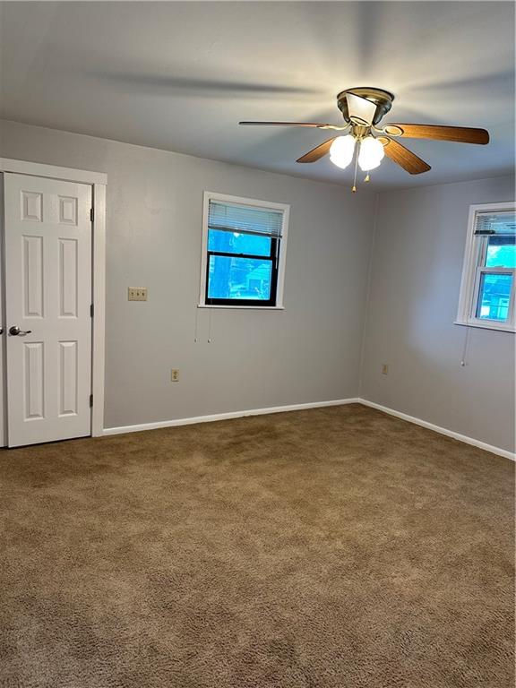611 Mercer Road Beaver Falls, PA 15010 - Photo 21 of 32 a view of an empty room with chandelier fan