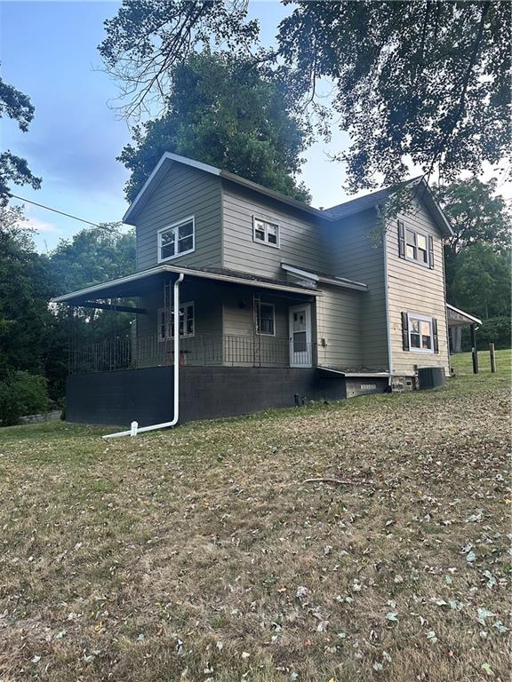611 Mercer Road Beaver Falls, PA 15010 - Photo 3 of 32 a view of a house with a yard