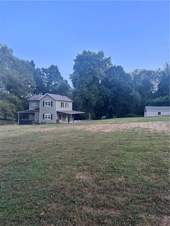 611 Mercer Road Beaver Falls, PA 15010 - Photo 32 of 32 a view of house with outdoor space and garden
