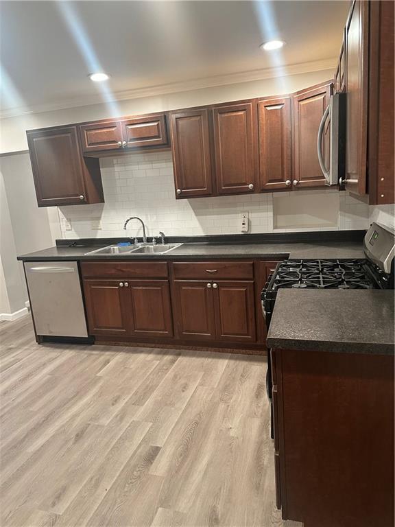 611 Mercer Road Beaver Falls, PA 15010 - Photo 7 of 32 a kitchen with stainless steel appliances granite countertop a sink and cabinets