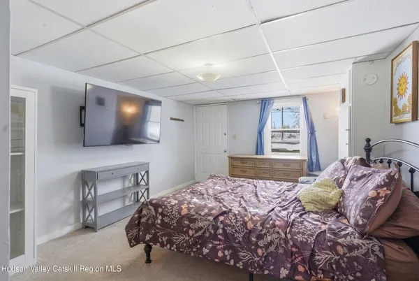 a kitchen with appliances a sink and cabinets