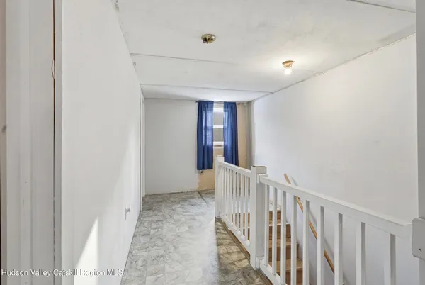 a group of cars parked in front of a house