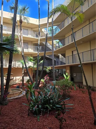 a view of building with sitting area