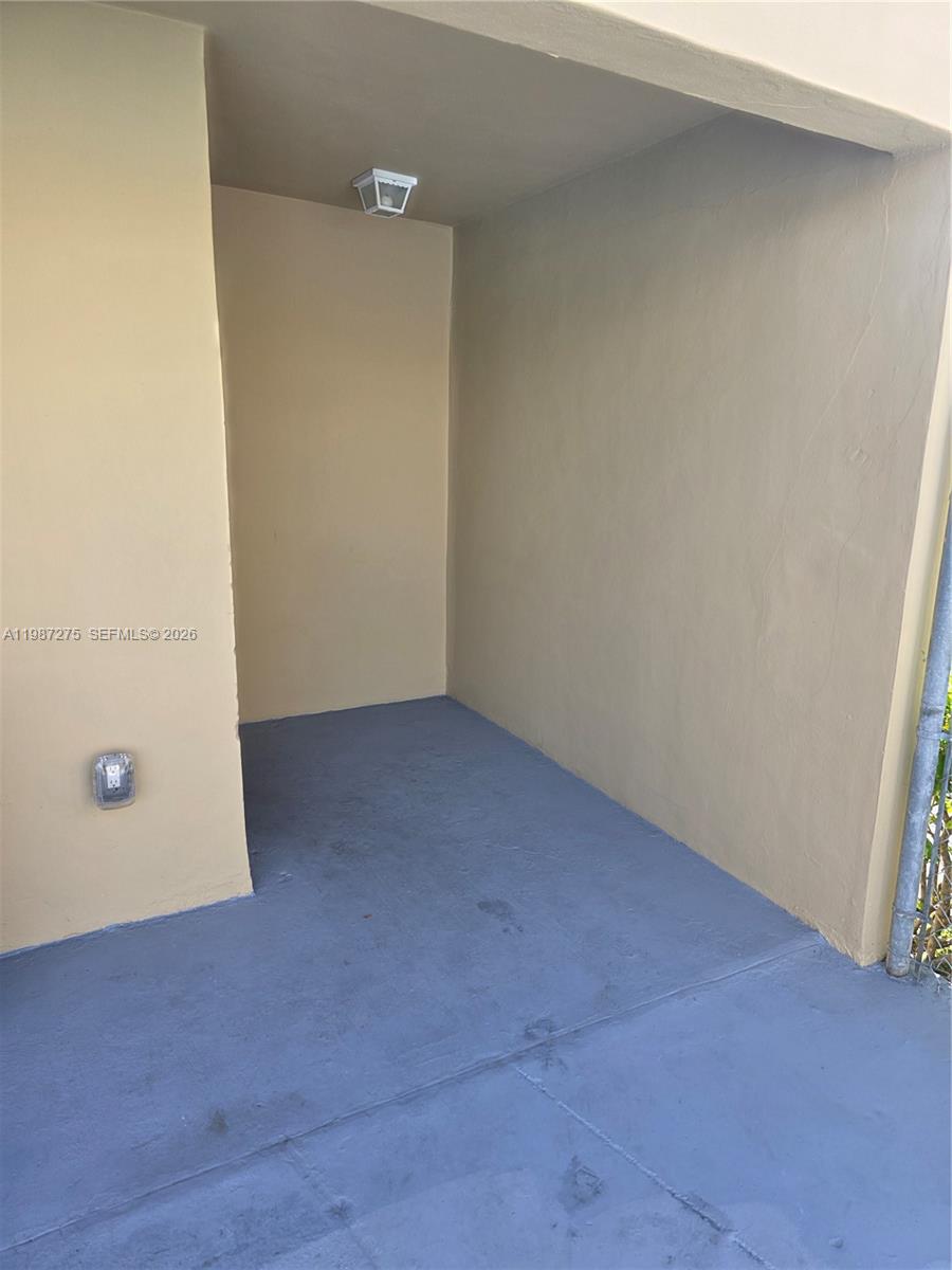 8615 Northwest 8th Street, Unit 319 Miami, FL 33126 - Photo 14 of 19 a view of an empty room
