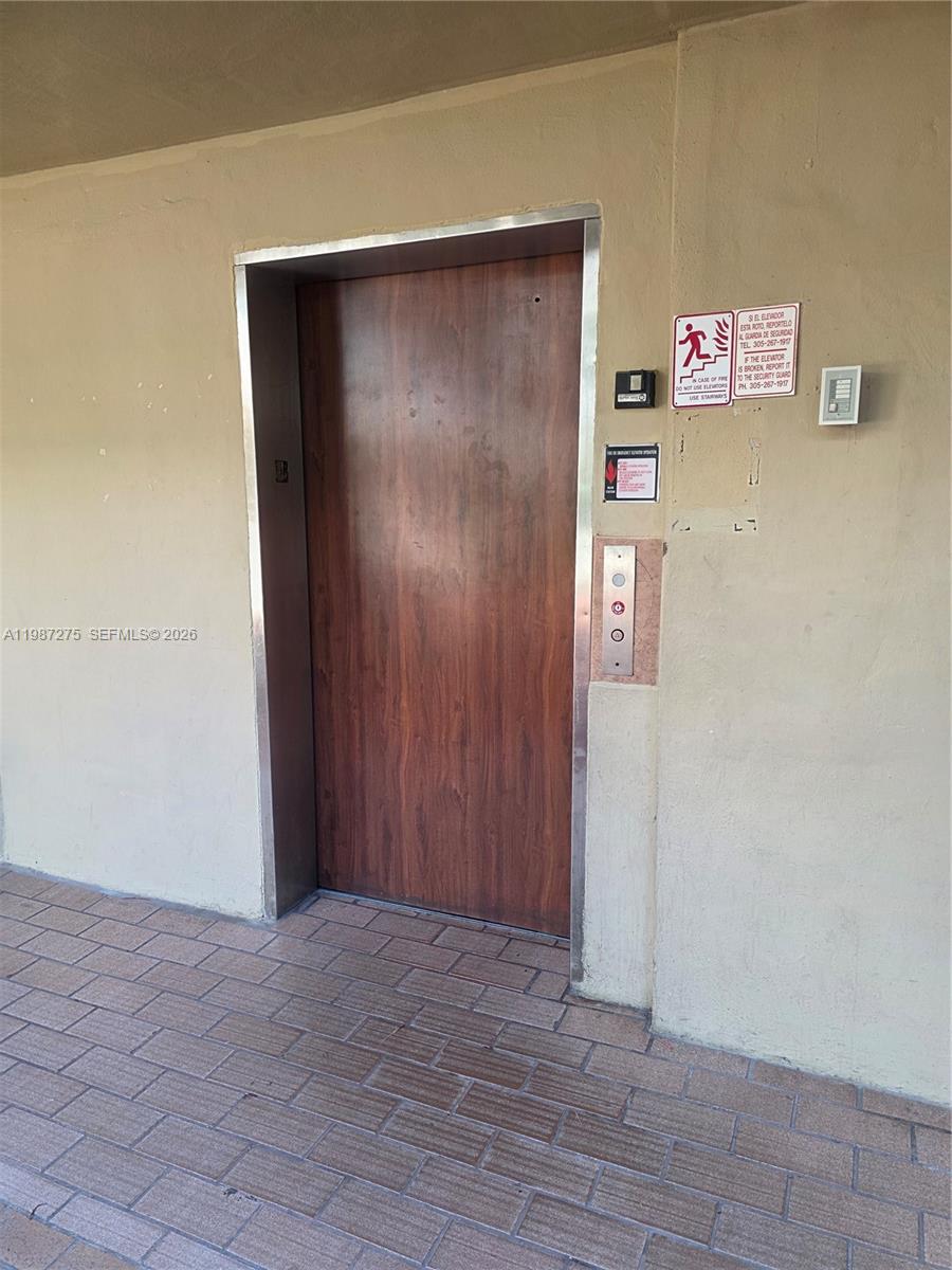 8615 Northwest 8th Street, Unit 319 Miami, FL 33126 - Photo 9 of 19 a view of an front door
