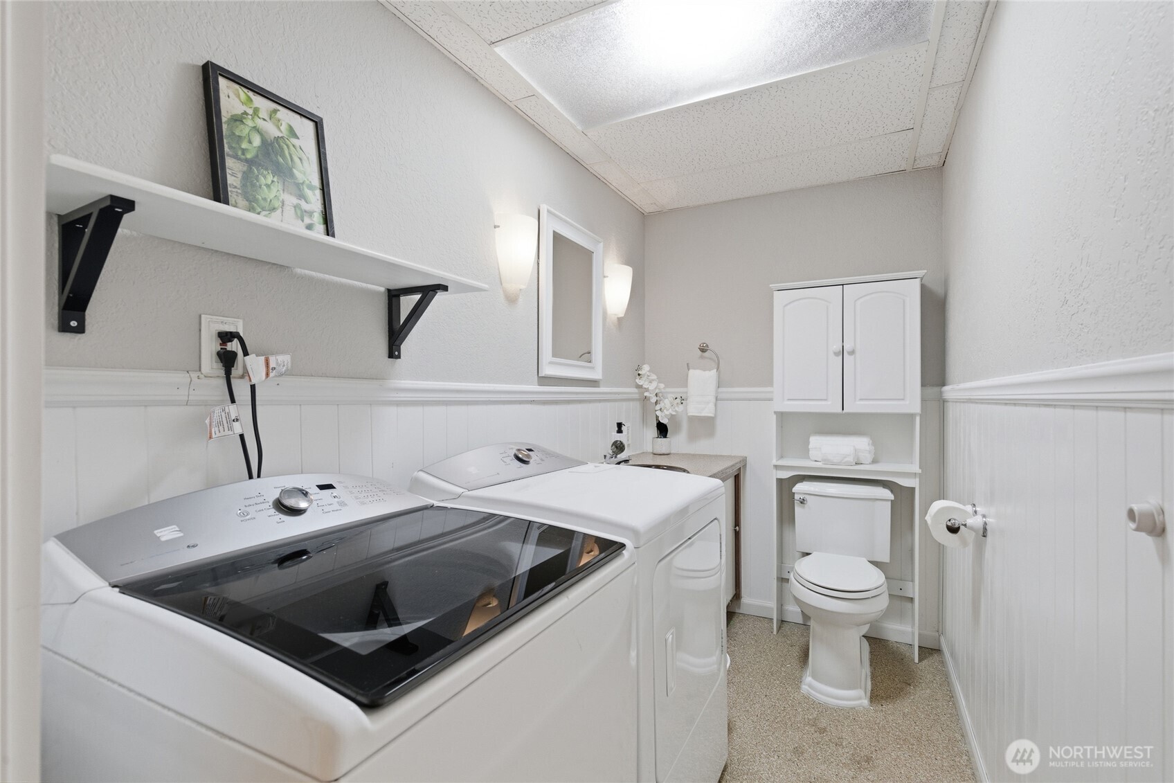 13011 Seattle Hill Road Snohomish, WA 98296 - Photo 29 of 40 a kitchen with a stove sink and a refrigerator