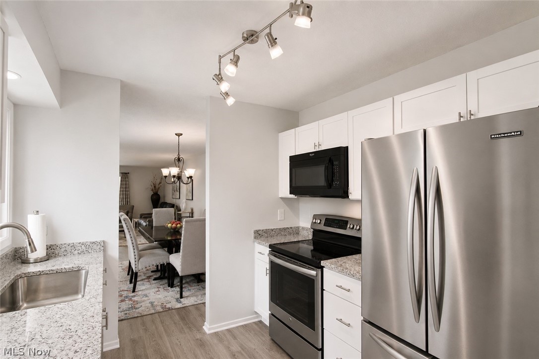 16575 Wren Road, Unit 3C Chagrin Falls, OH 44023 - Photo 9 of 29 New LG Dishwasher and Stainless steel appliances