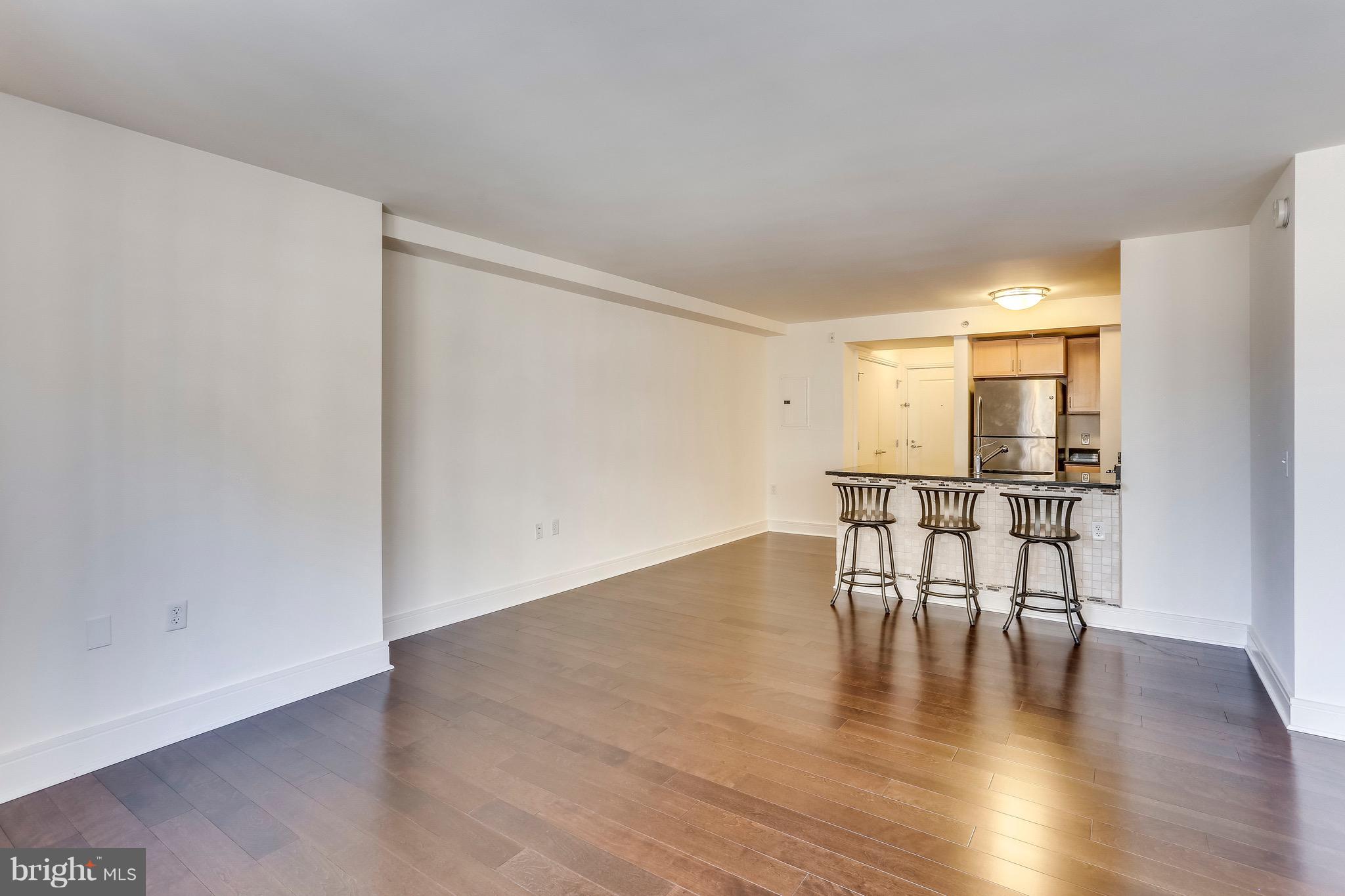 800 4th Street Southwest, Unit N111 Washington, DC 20024 - Photo 25 of 35 a view of a room with wooden floor and a window