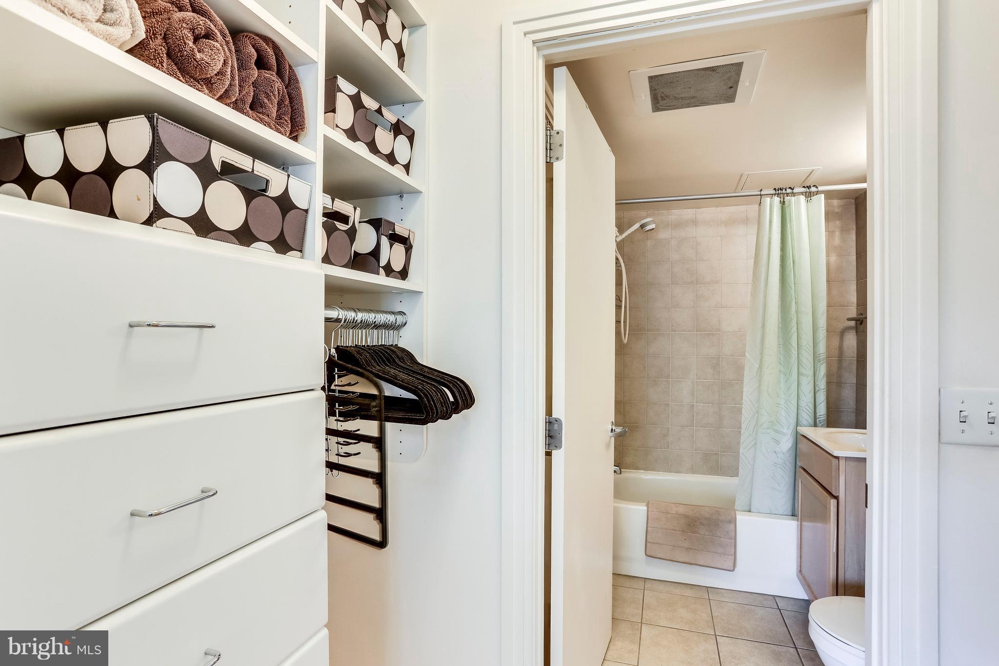 800 4th Street Southwest, Unit N111 Washington, DC 20024 - Photo 29 of 35 a bathroom with a shower and a sink