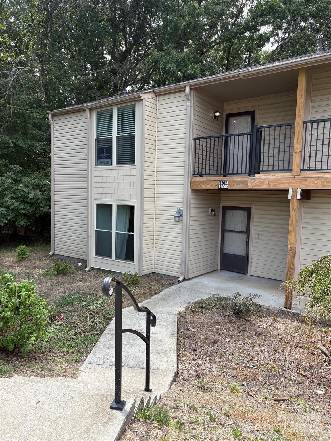 11014 Running Ridge Road Charlotte, NC 28226 - Photo 22 of 25 a front view of a house with garden
