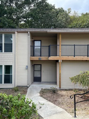 a house with river in front of it