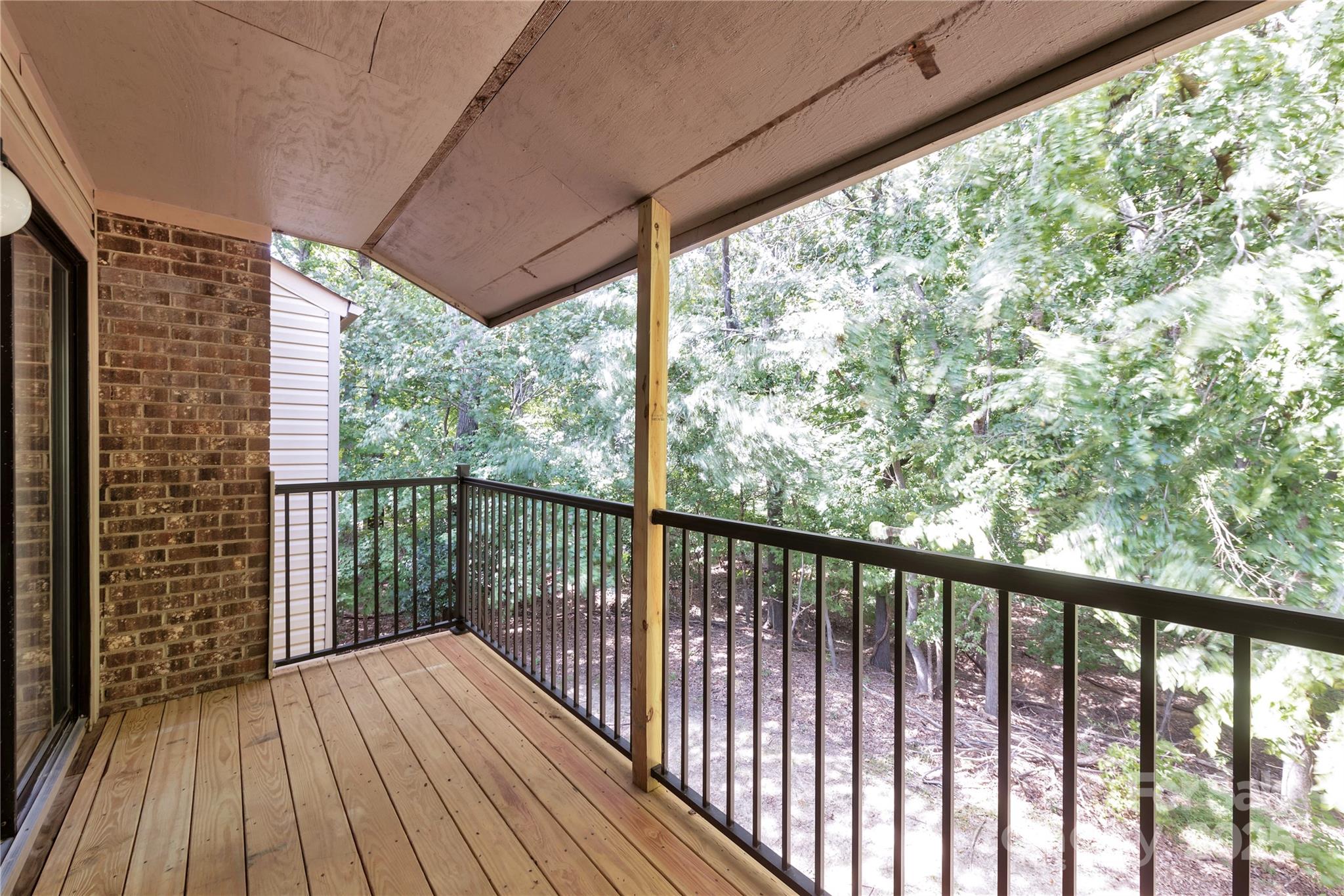 11014 Running Ridge Road Charlotte, NC 28226 - Photo 10 of 25 a view of balcony with wooden floor