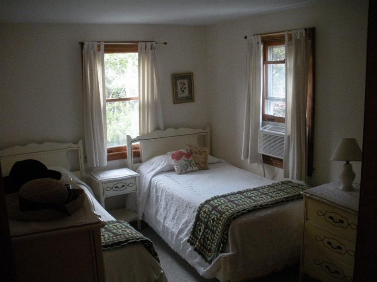 170 Ridgevale Road Chatham, MA 02633 - Photo 17 of 22 a bedroom with a bed and a window