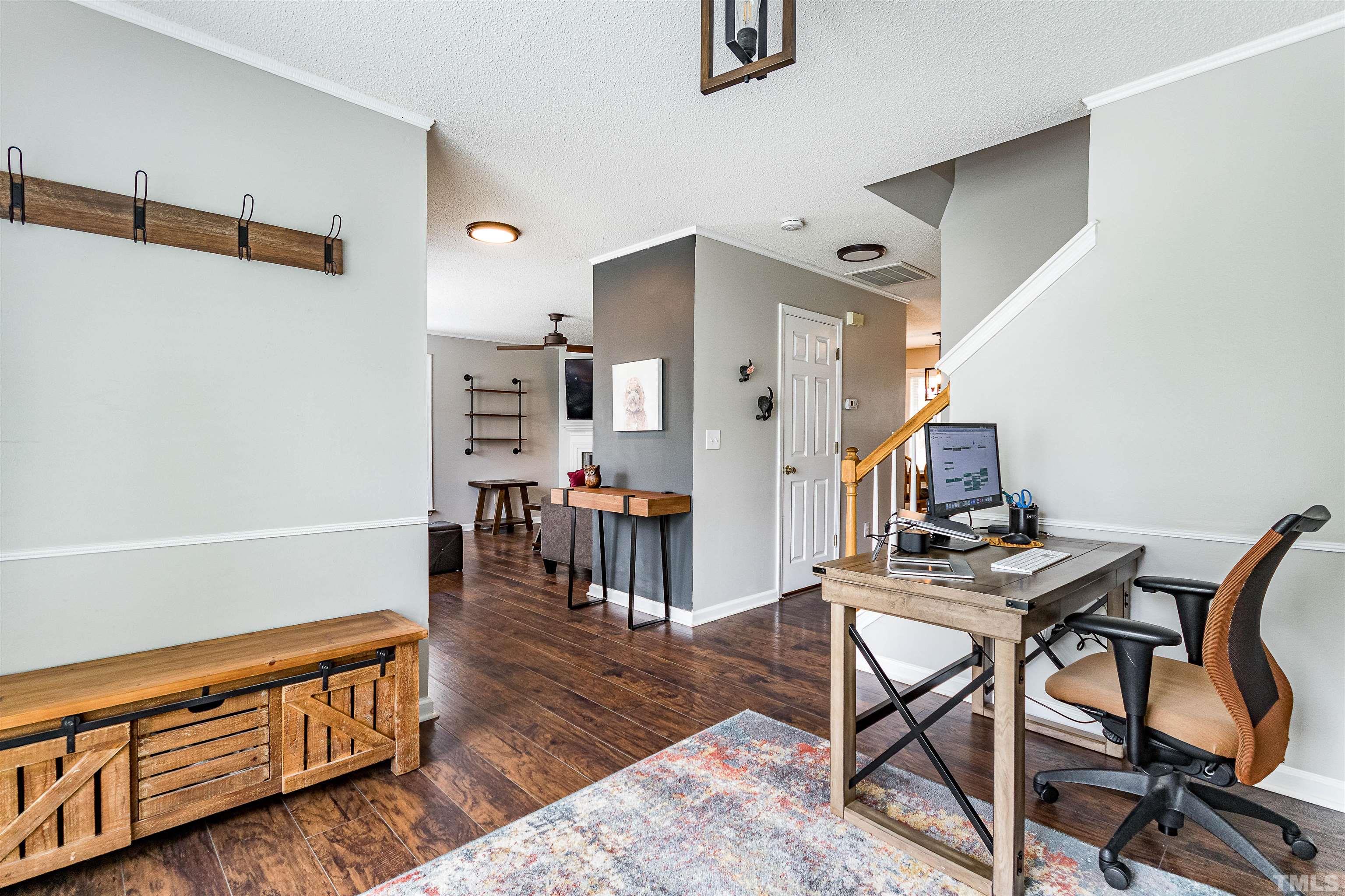 107 Ridge Lake Drive Apex, NC 27539 - Photo 11 of 27 a living room with furniture and wooden floor