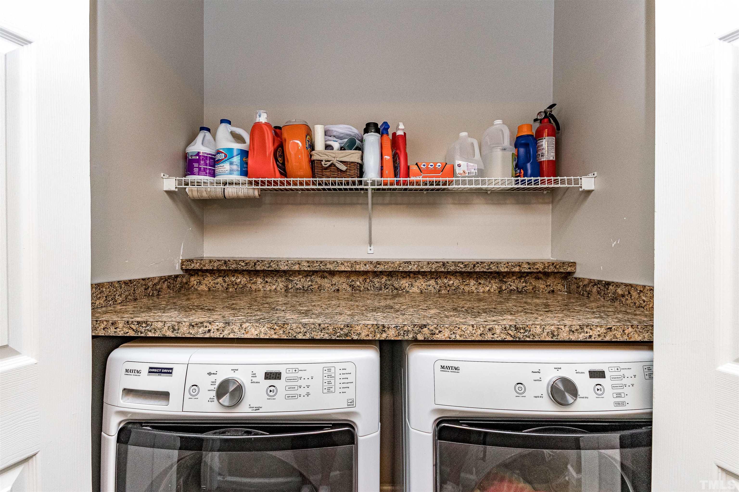 107 Ridge Lake Drive Apex, NC 27539 - Photo 13 of 27 a close view of washer and dryer