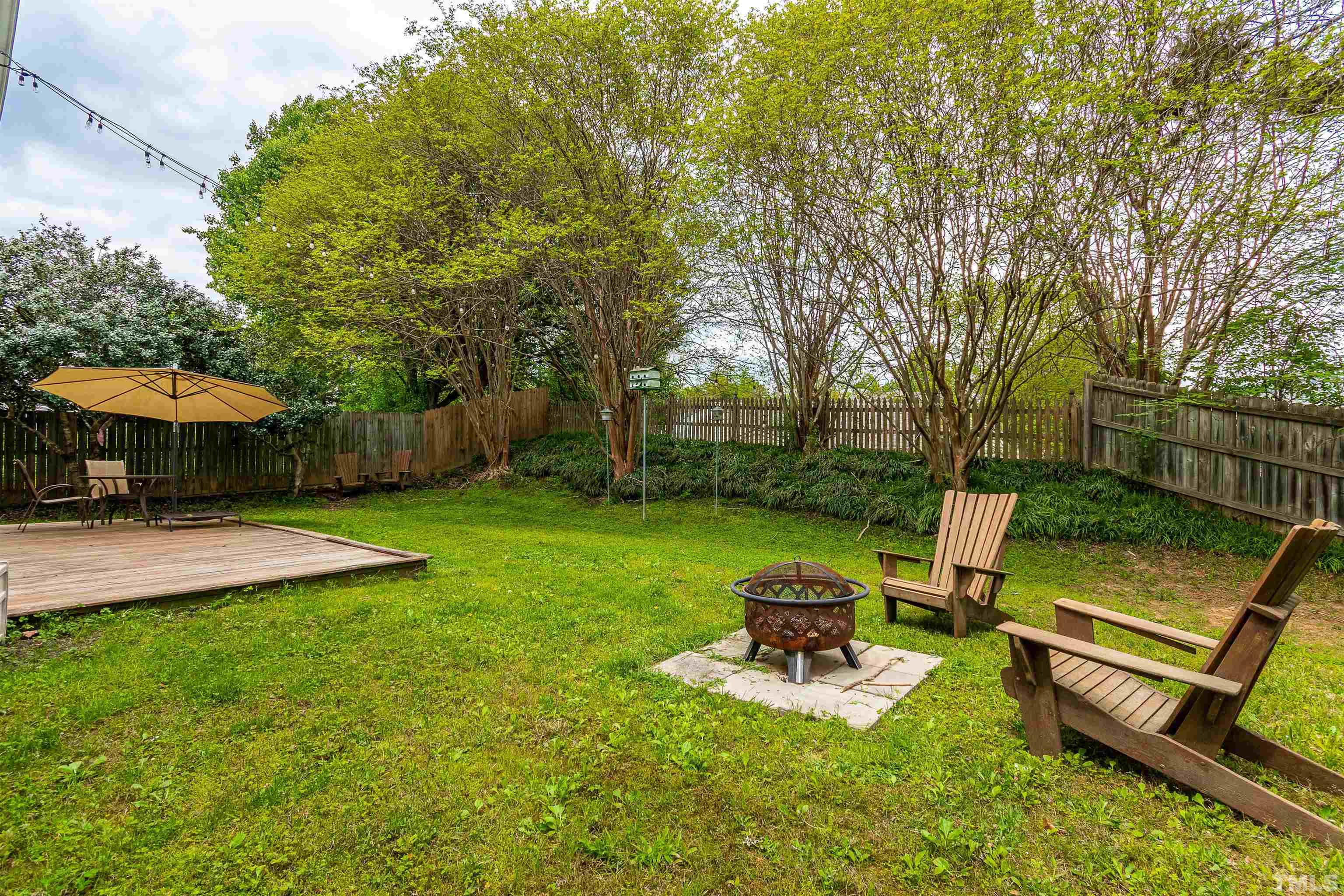 107 Ridge Lake Drive Apex, NC 27539 - Photo 27 of 27 a garden view with a seating space