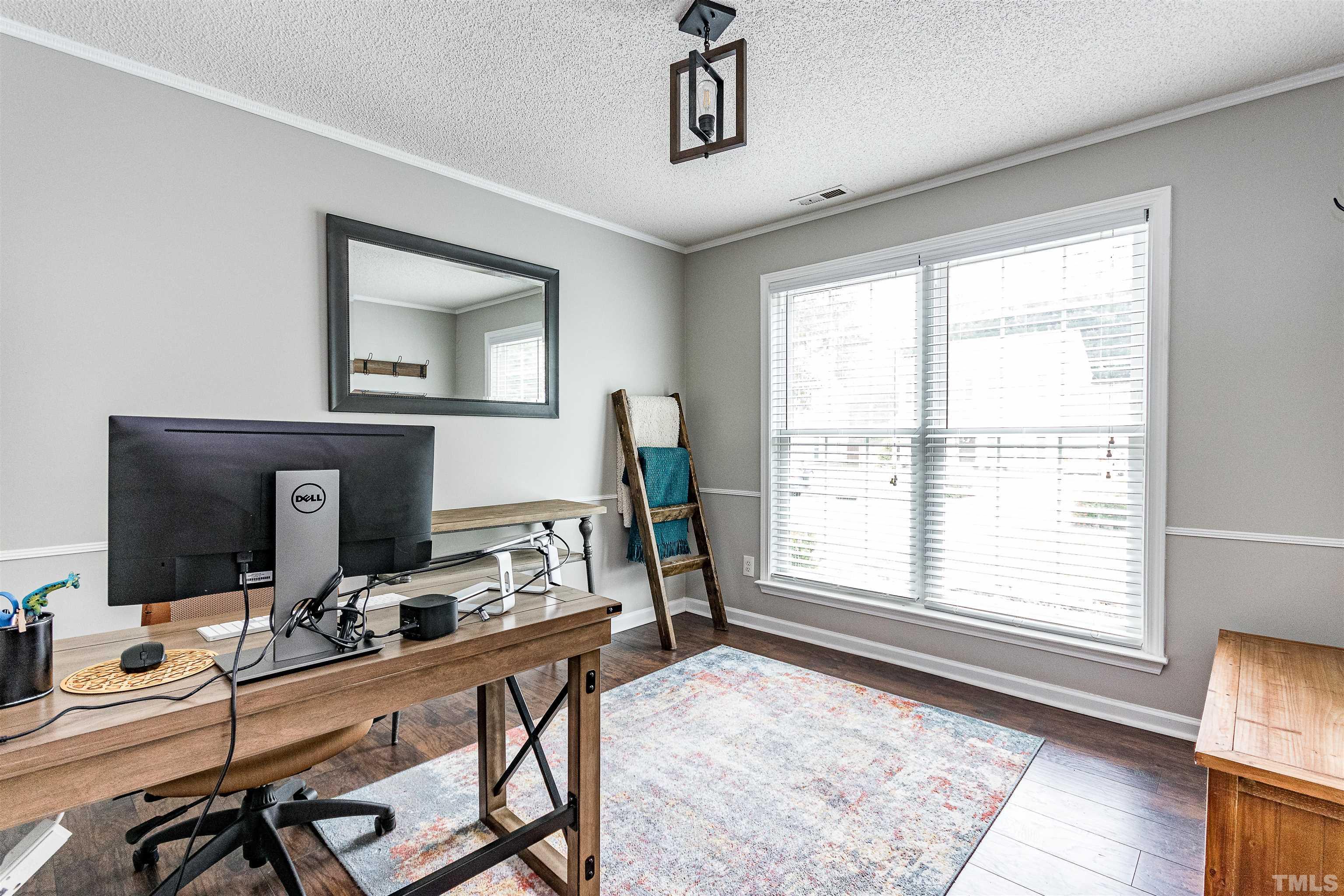 107 Ridge Lake Drive Apex, NC 27539 - Photo 10 of 27 a room with furniture and a window