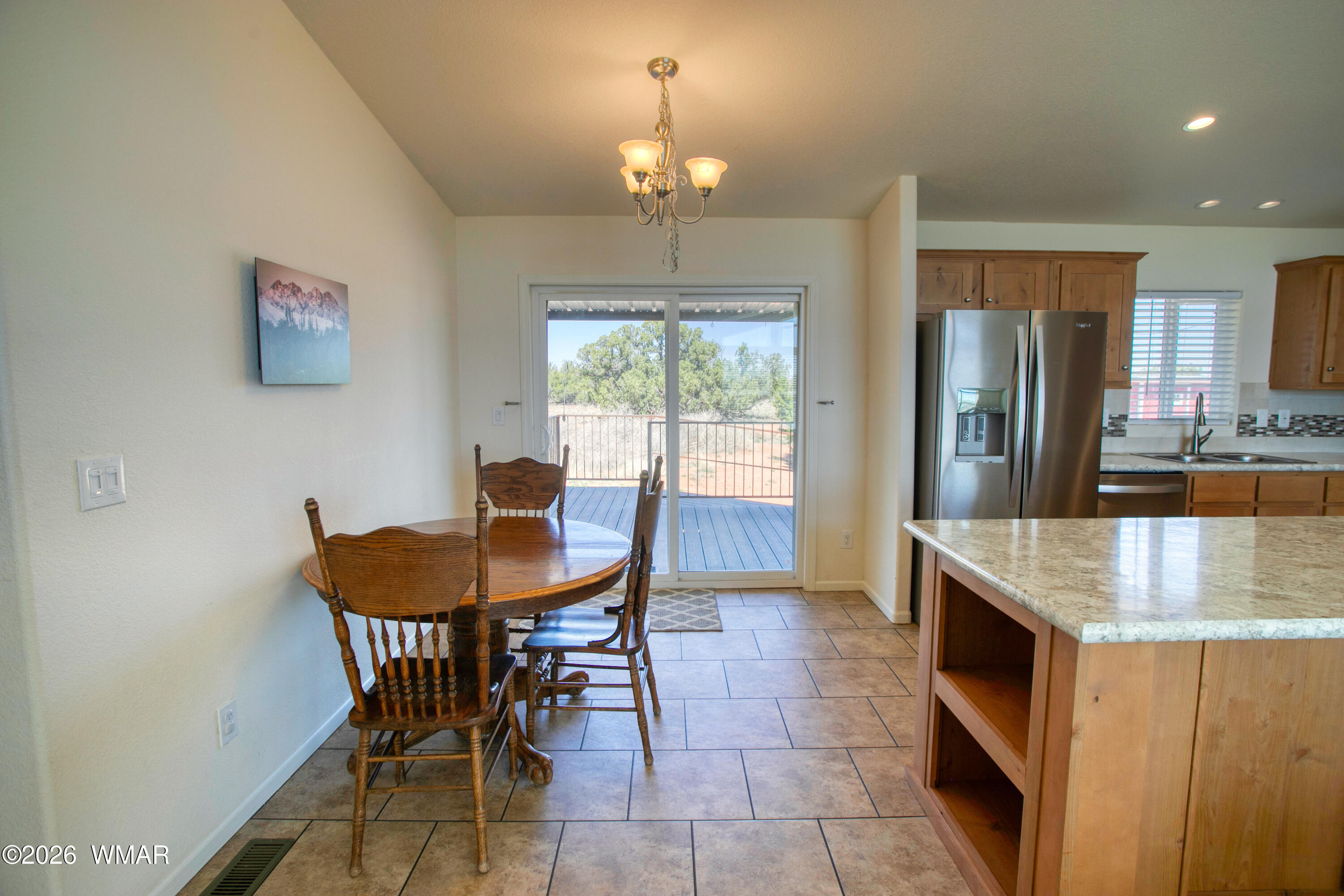 3869 Petersen Road Snowflake, AZ 85937 - Photo 10 of 29 a dining room with furniture and window