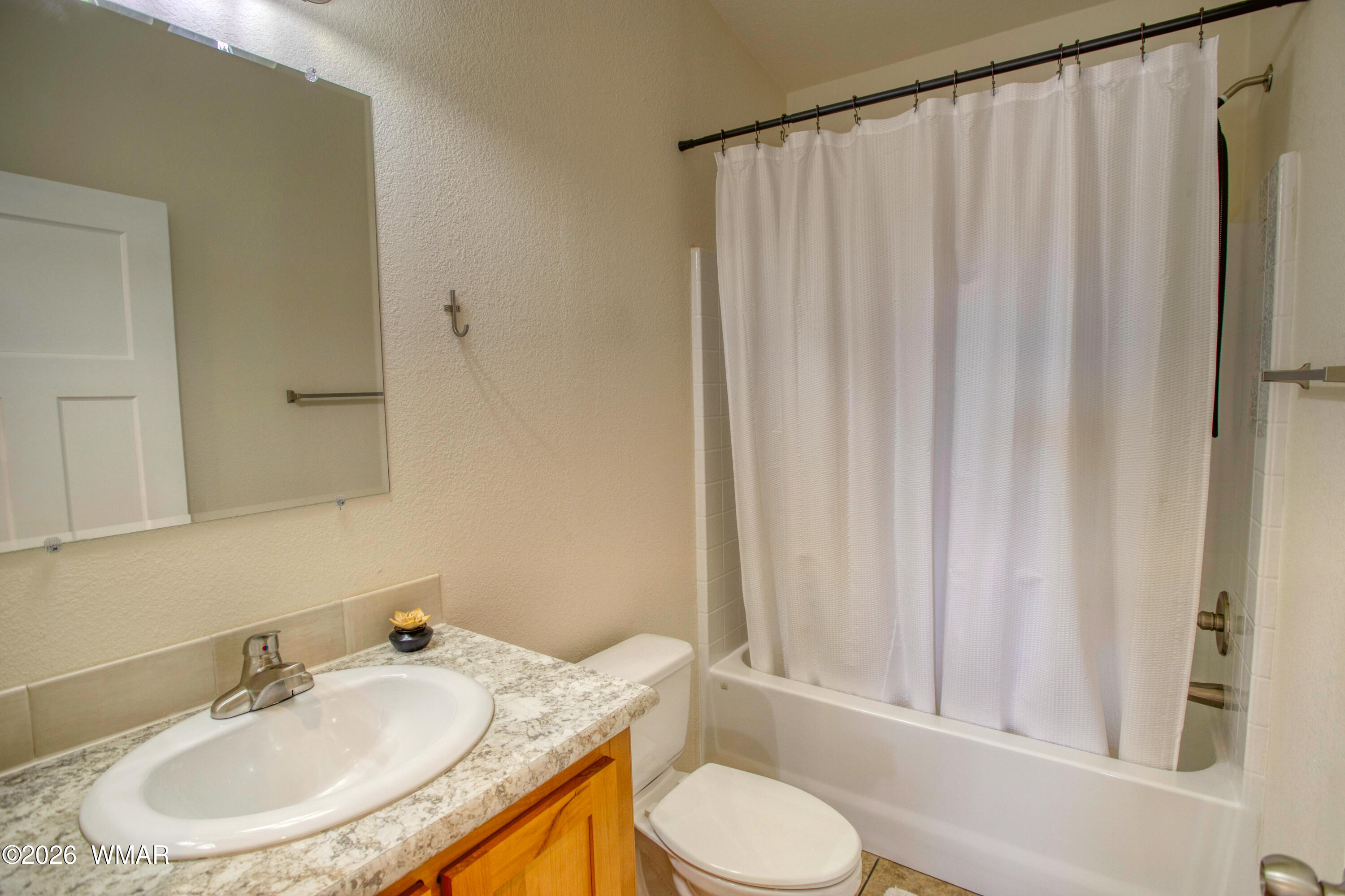 3869 Petersen Road Snowflake, AZ 85937 - Photo 15 of 29 a bathroom with a sink toilet and shower