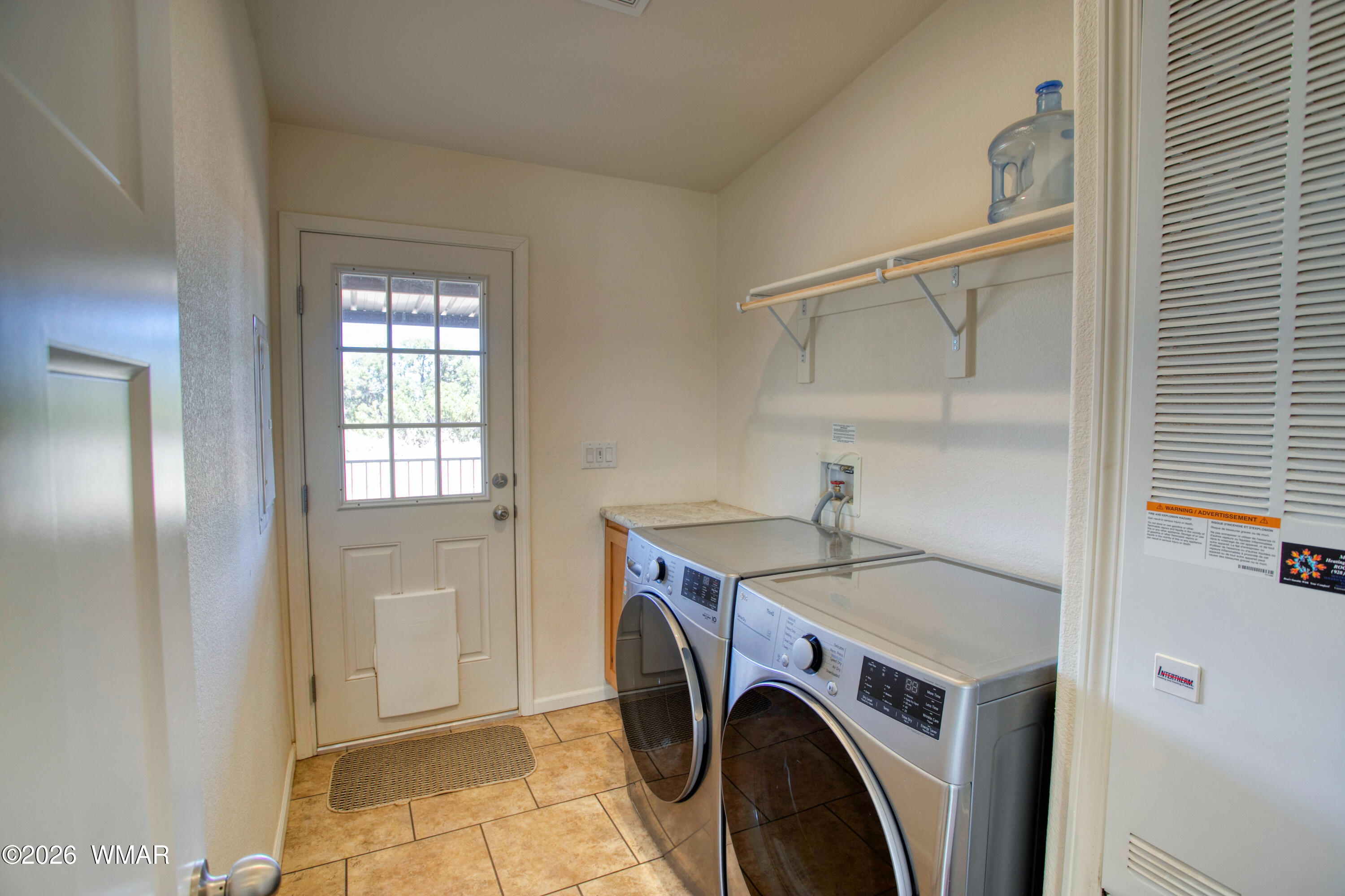 3869 Petersen Road Snowflake, AZ 85937 - Photo 18 of 29 a utility room with dryer and washer