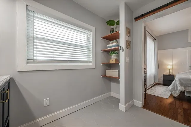a view of livingroom with furniture and window