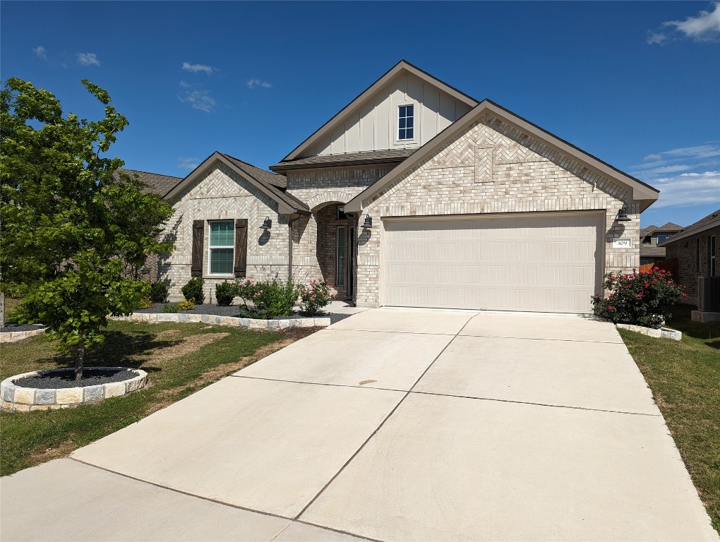 a view of garage yard and tree