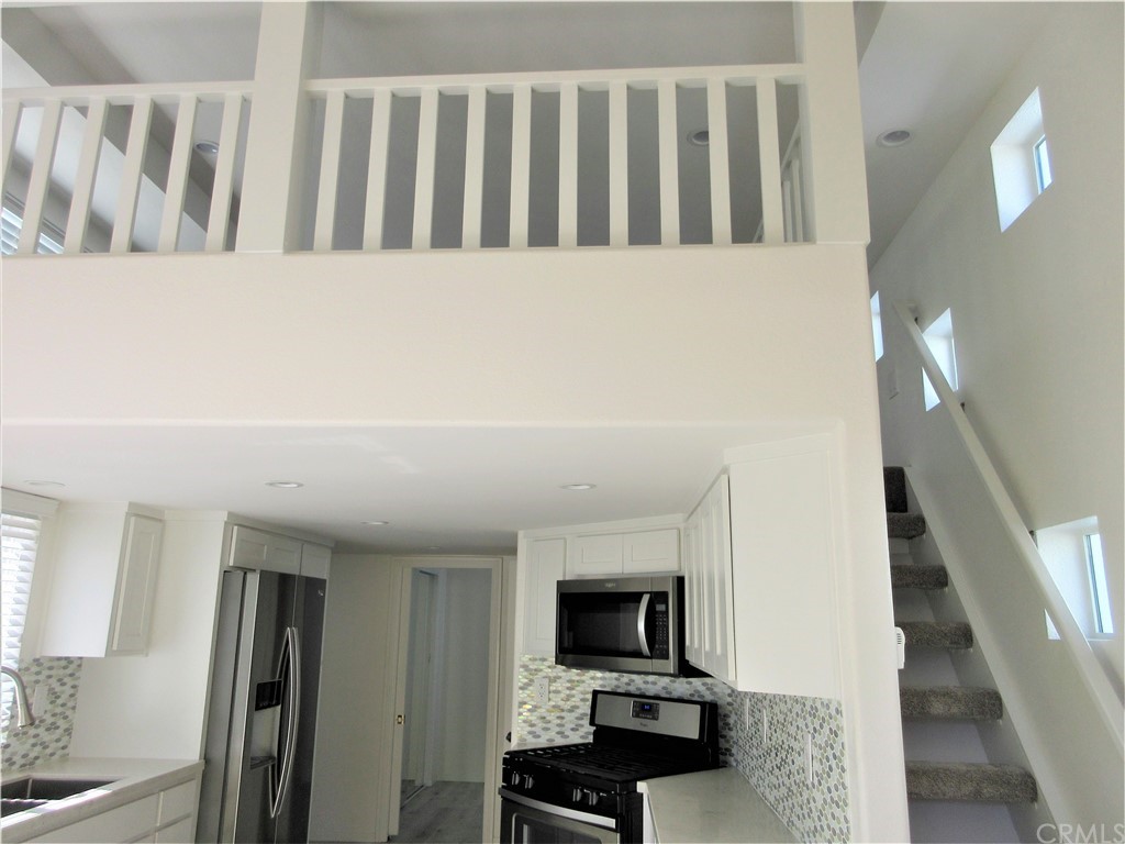 105 Sandy Drive San Clemente, CA 92672 - Photo 3 of 17 Loft area height is too low to stand up. This area can be used as an extra sleeping area or storage