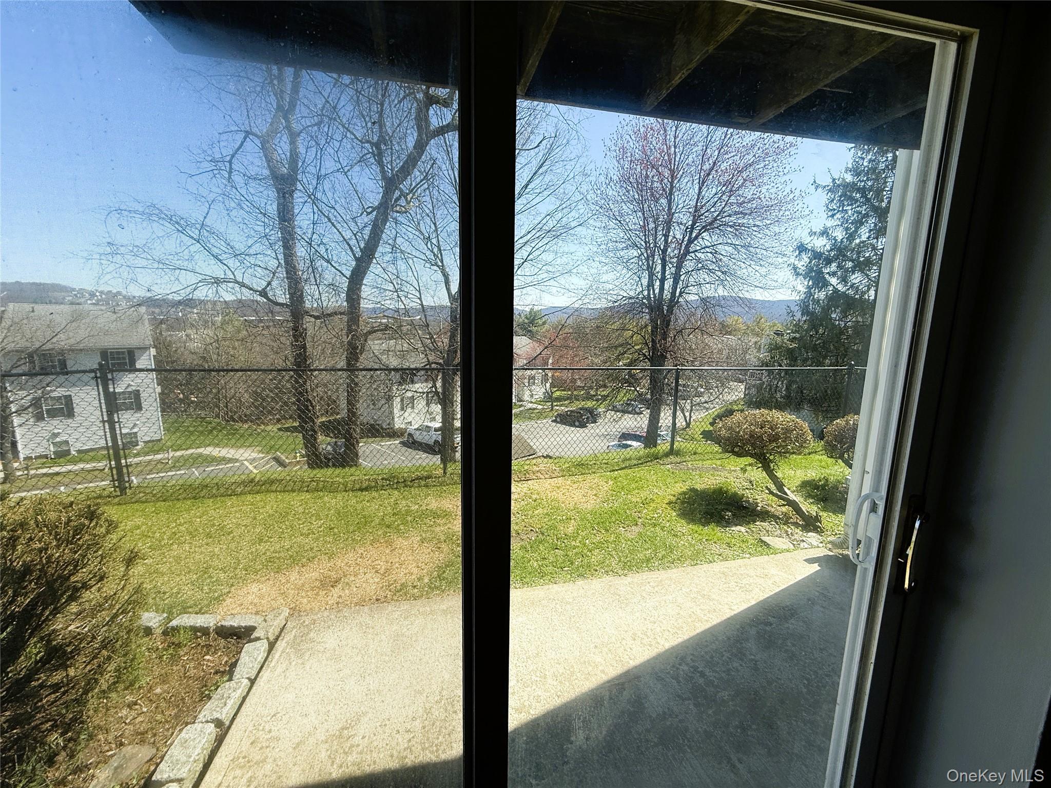 25 Lexington Hills Road, Unit 8 Harriman, NY 10926 - Photo 22 of 24 a view of a glass door
