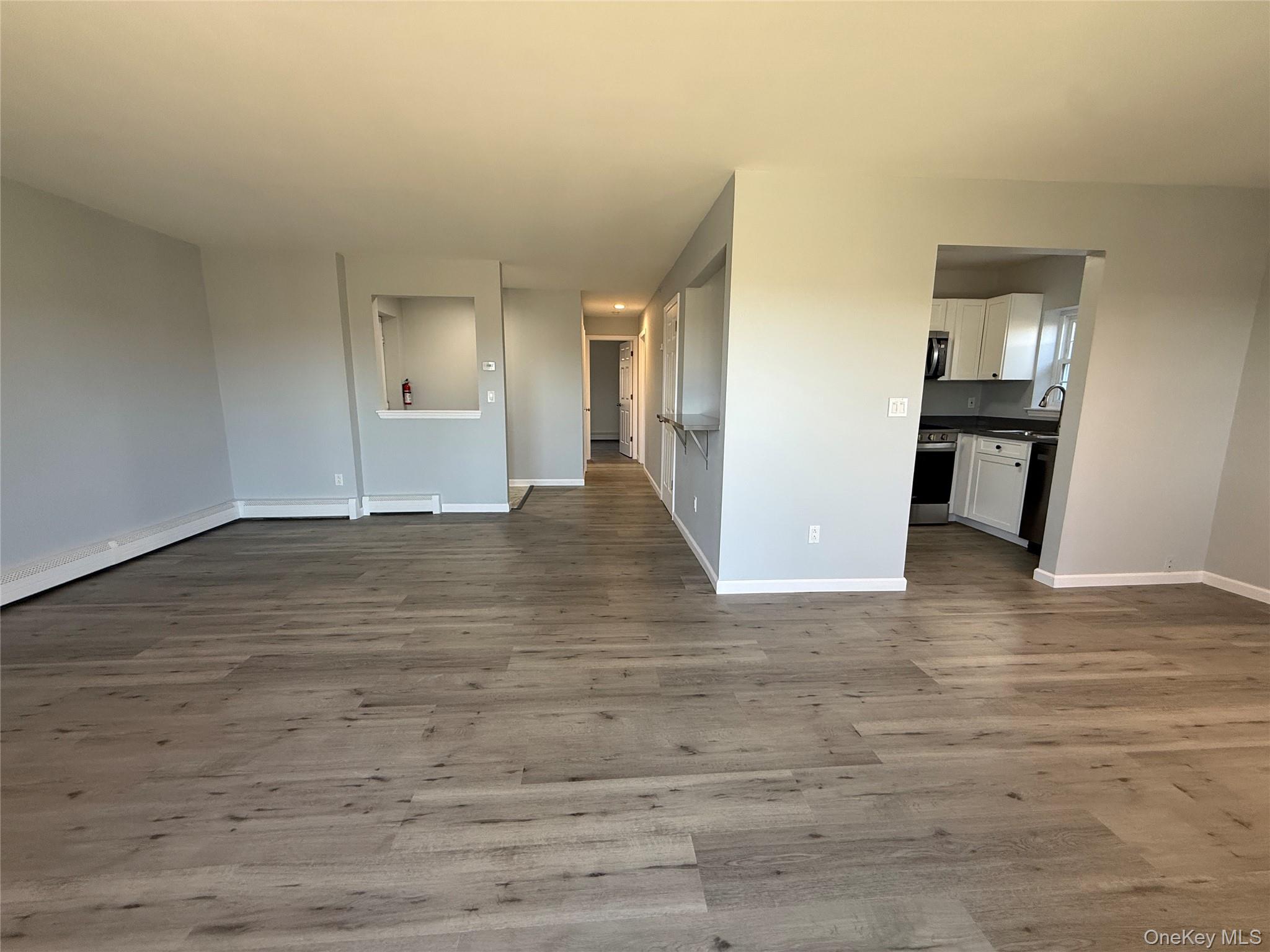 25 Lexington Hills Road, Unit 8 Harriman, NY 10926 - Photo 7 of 24 a view of empty room with wooden floor