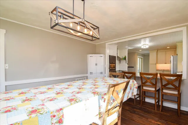 a kitchen with appliances cabinets and a sink