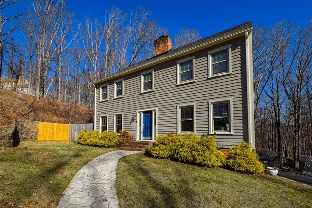 a front view of house with yard