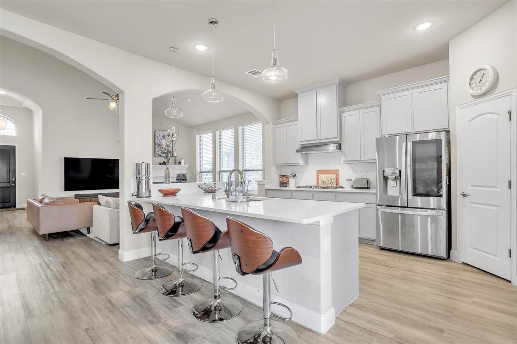 3522 Ridgecross Drive Rockwall, TX 75087 - Photo 2 of 34 Open bright white kitchen