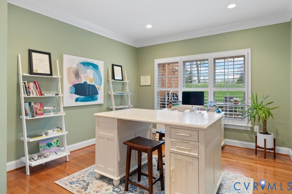 850 Elmslie Lane Manakin-Sabot, VA 23103 - Photo 21 of 48 a view of a workspace with furniture and a potted plant