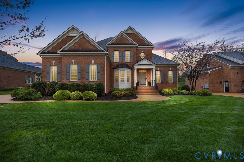 850 Elmslie Lane Manakin-Sabot, VA 23103 - Photo 3 of 48 a front view of a house with a garden
