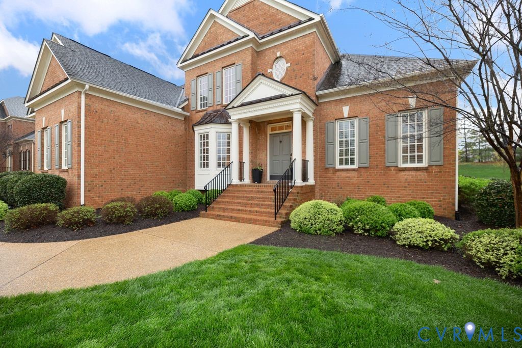 850 Elmslie Lane Manakin-Sabot, VA 23103 - Photo 4 of 48 a front view of a house with garden