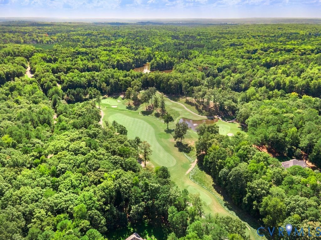 850 Elmslie Lane Manakin-Sabot, VA 23103 - Photo 44 of 48 a view of a green field with lots of bushes