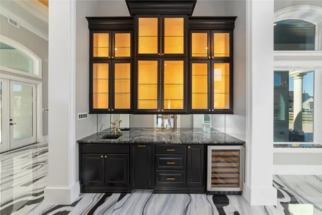 a view of a dining room with furniture and windows