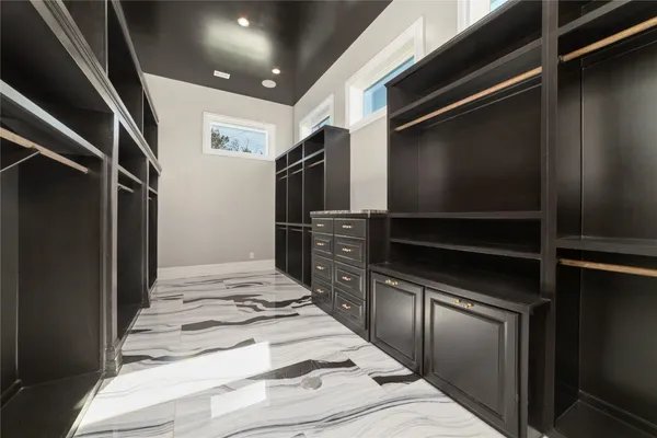 a view of kitchen and refrigerator