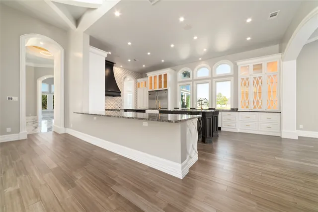 a kitchen with a sink and cabinets
