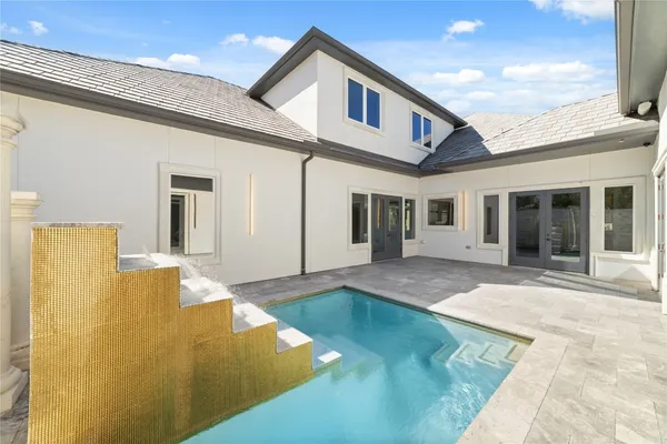 a front view of a house having yard