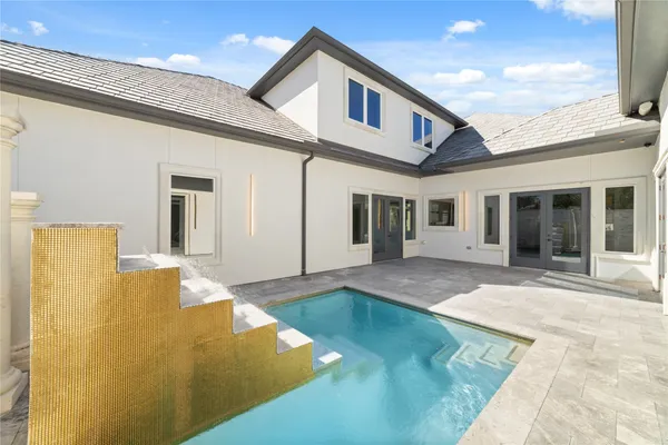 a front view of a house having yard