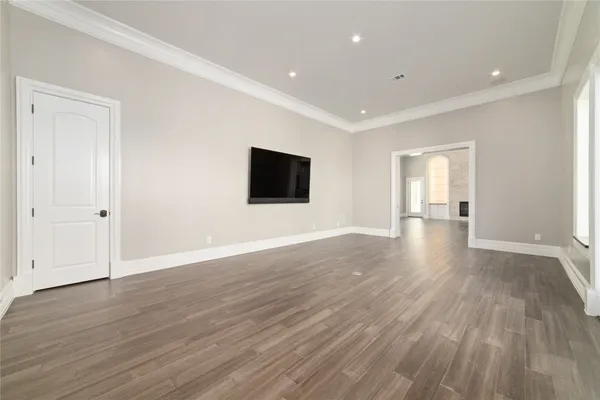 a view of a livingroom with wooden floor