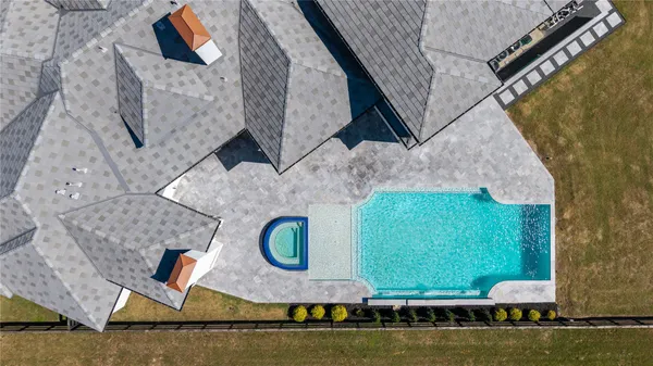 swimming pool with view of living room