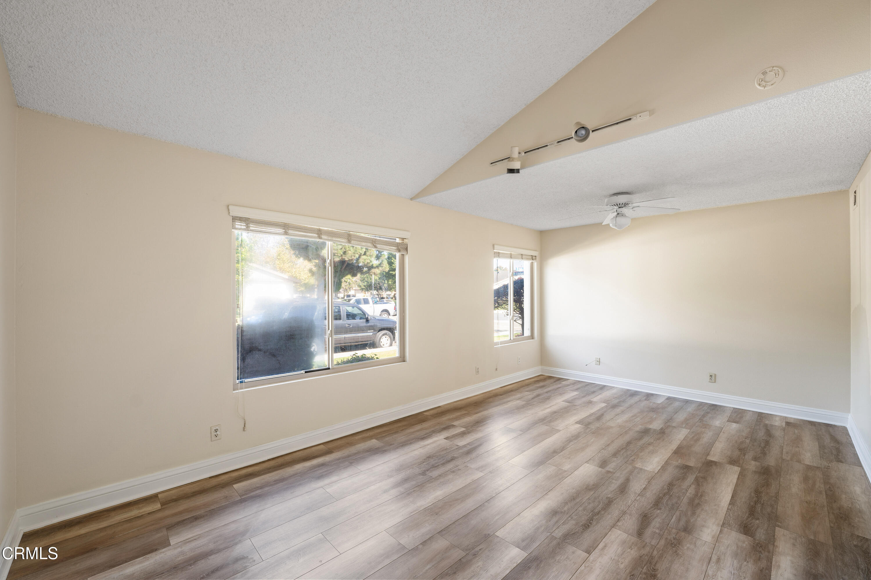 500 Holly Avenue Oxnard, CA 93036 - Photo 23 of 33 a view of empty room with wooden floor and fan