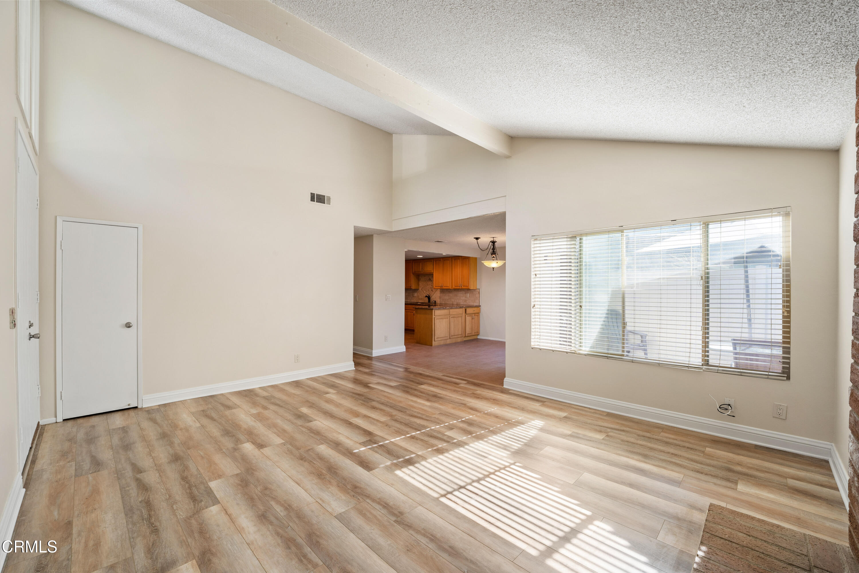 500 Holly Avenue Oxnard, CA 93036 - Photo 7 of 33 a view of an empty room with a window and a bathroom