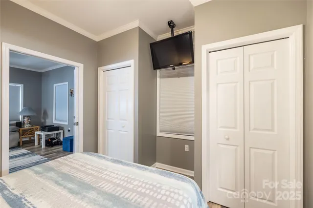 a bathroom with a granite countertop sink mirror and shower