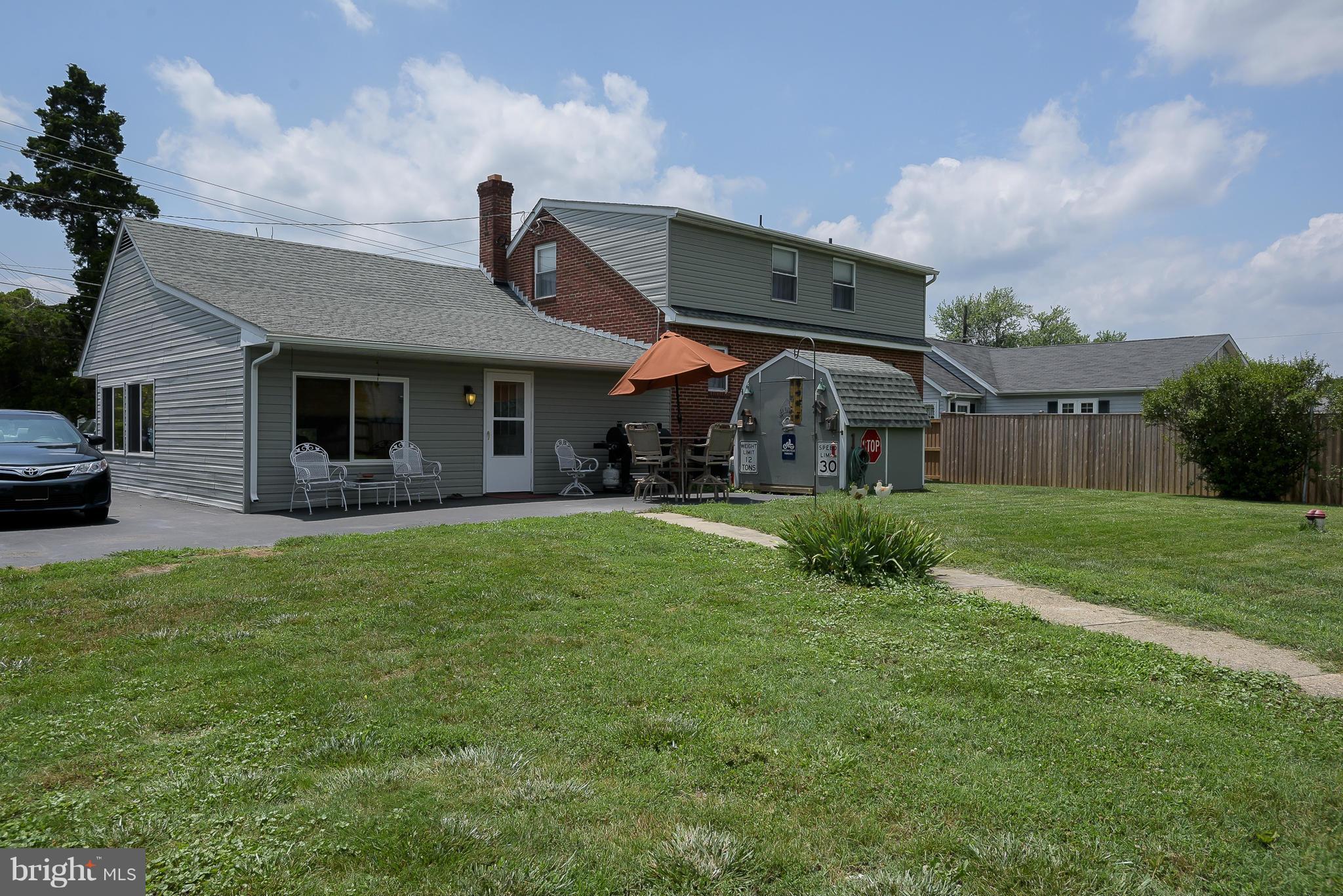 636 Deale Road Deale, MD 20751 - Photo 23 of 30 a front view of a house with garden