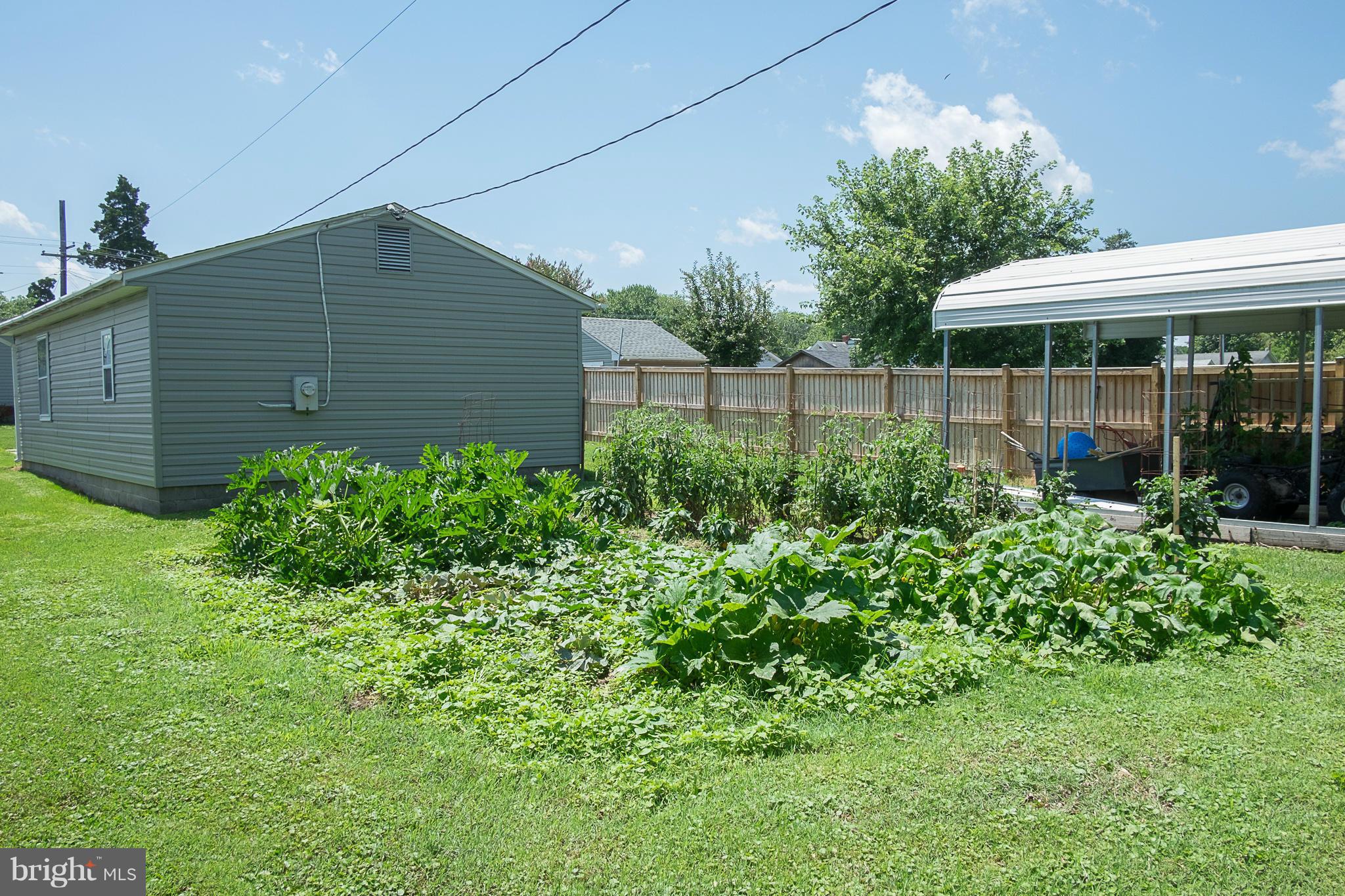 636 Deale Road Deale, MD 20751 - Photo 26 of 30 a backyard of a house with lots of green space