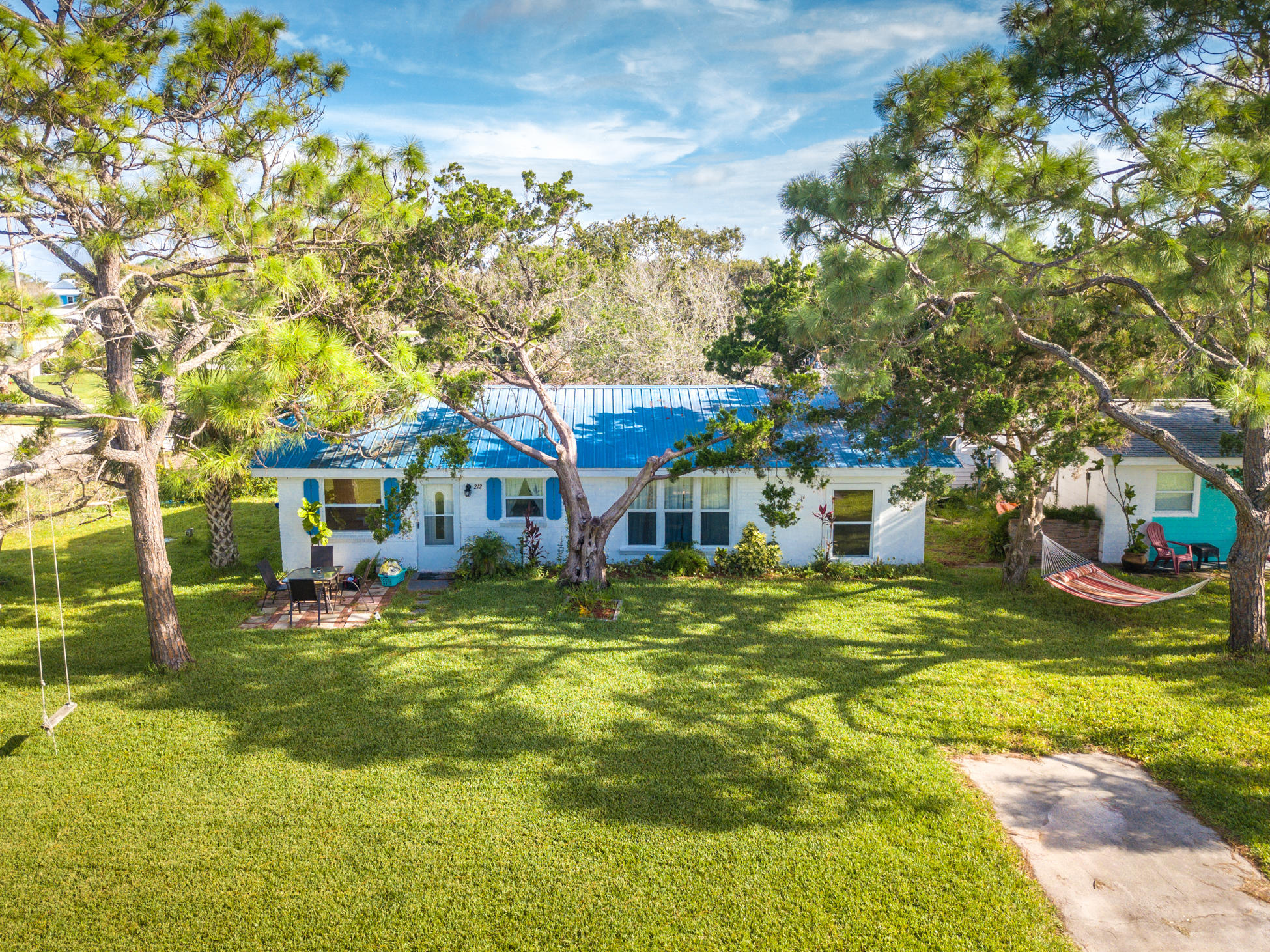210 Palmetto Road St. Augustine, FL 32080 - Photo 1 of 16 a view of a house with a big yard